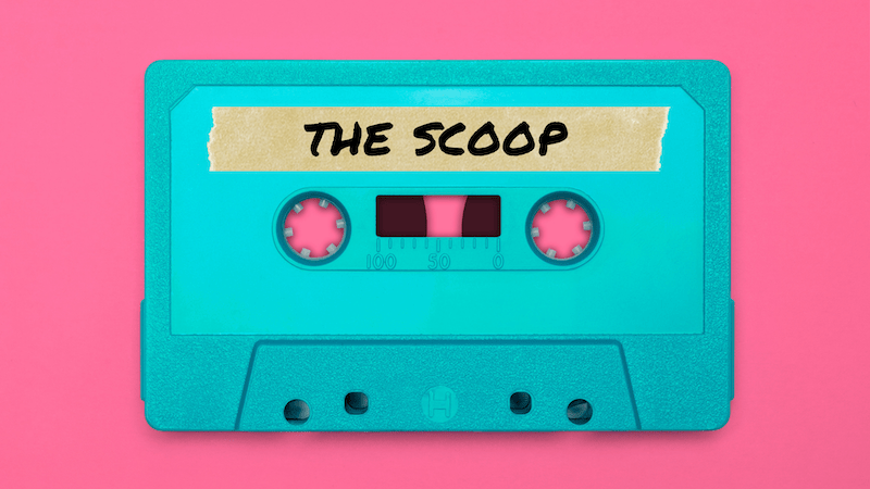 A cassette tape with yellow tape on the top, labelling it "the scoop"
